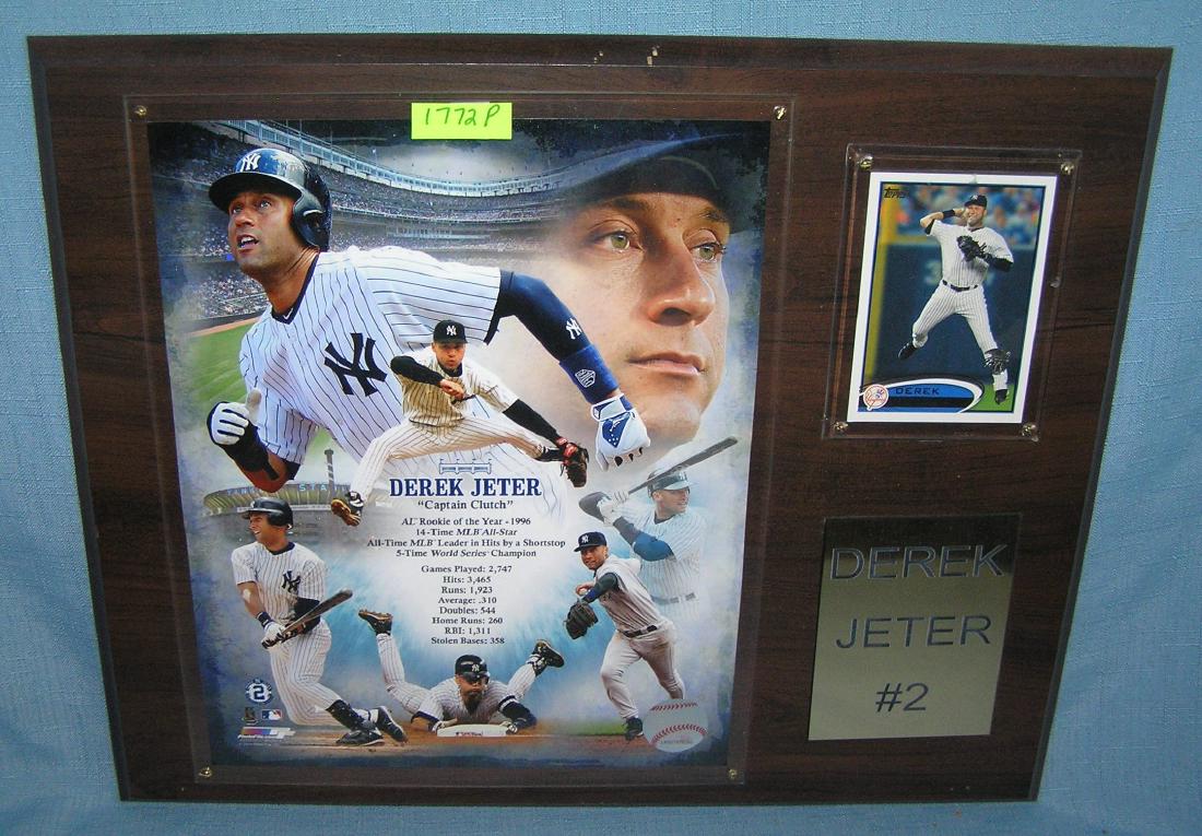 Vintage Derek Jeter photo and baseball card wall plaque: Vintage Derek Jeter photo and baseball card wall plaque titled Capt. Clutch est. value $65.00-$75.00