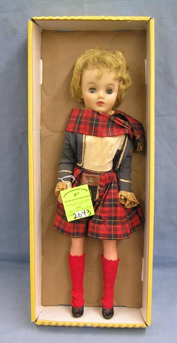 Vintage vinyl plaid stamp girl doll: Vintage 20 inch vinyl plaid stamp girl promotional premium doll circa 1950’s est. value $50.00-$75.00