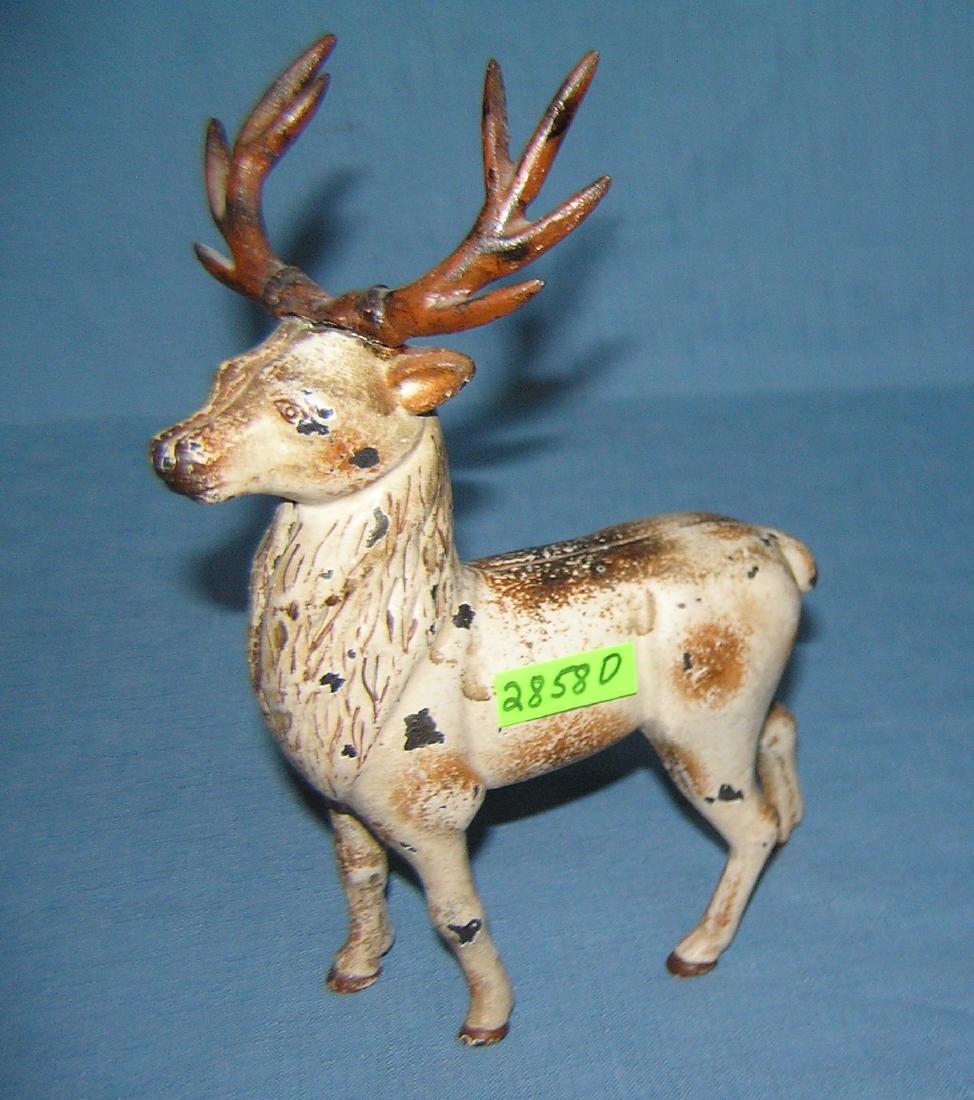 Cast iron large painted male deer bank: Cast iron large painted male deer with 8 point rack bank est. value $125.00-$150.00