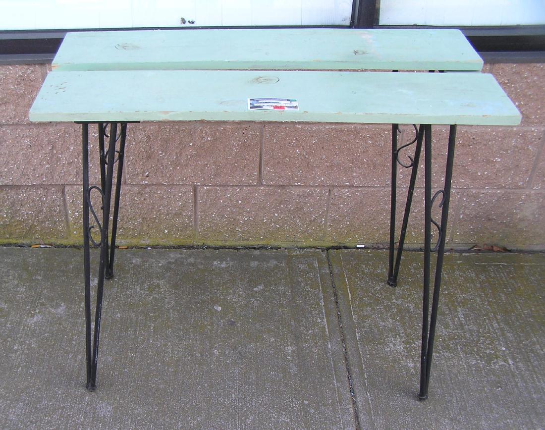 Wood and wrought iron side table: Wood and wrought iron side table possibly Singer sewing machine stand has the S mark mounted on all 4 legs circa 1920's part of a moving and storage company seized merchandise liquidation est. value $