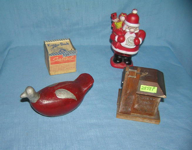 Group of four antique and vintage coin banks May 09, 2019 Baker's