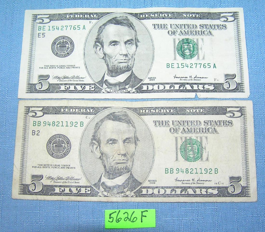 Pair of old style US five dollar bills: Pair of old style pre colorization US five dollar bills est. value $35.00-$50.00
