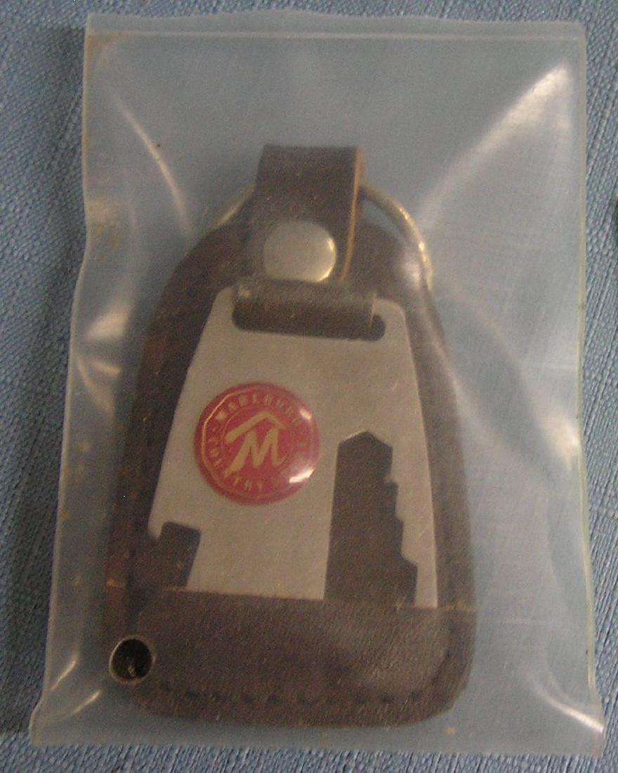 Vintage Marlboro bottle opener and key chain: Vintage Marlboro promotional advertising bottle opener and key chain mint in unopened bag est. value $25.00-$30.00