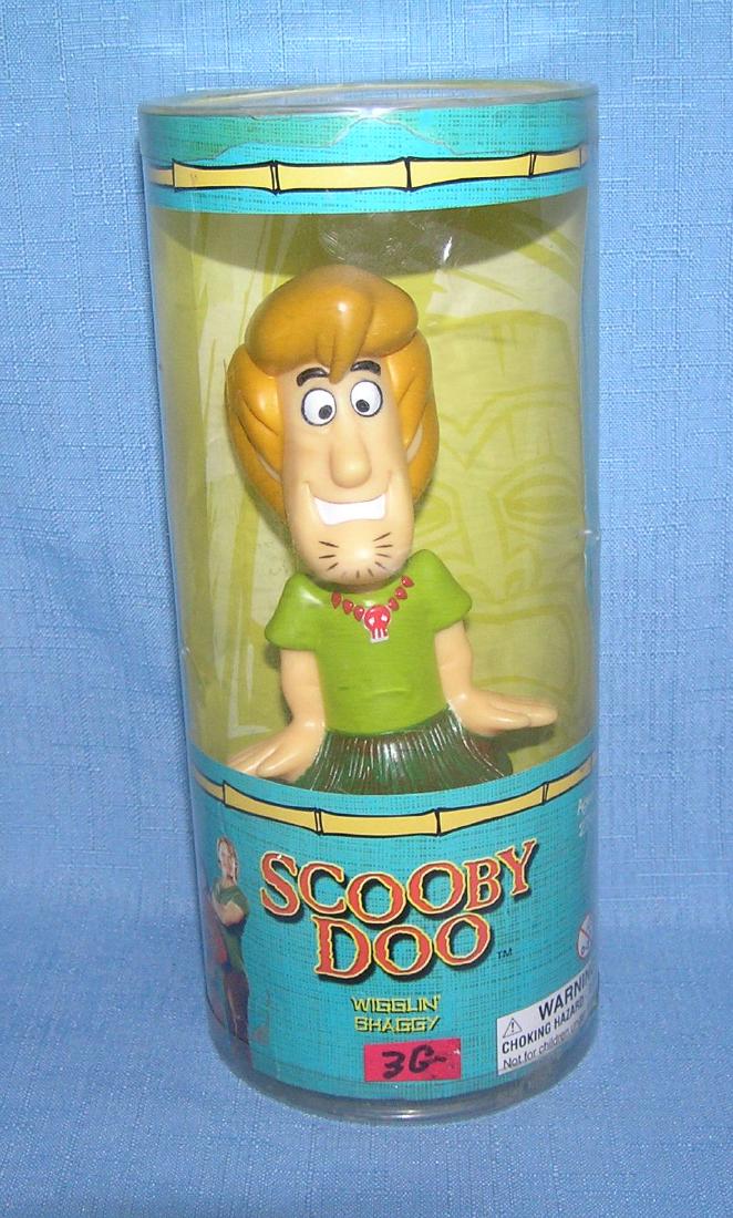 Scooby Doo wigglin Shaggy figure: Scooby Doo wigglin Shaggy figure mint in original package est. value $20.00-$25.00