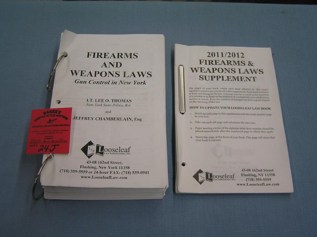Pair of fire arms and weapons law books: Pair of fire arms and weapons law books est. value $40.00-$50.00