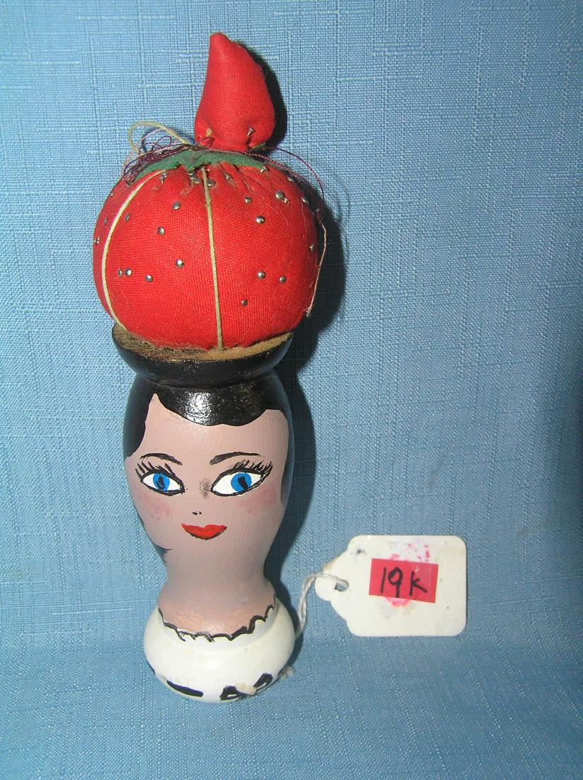 Hand painted wooden pin cushion doll: Hand painted wooden pin cushion doll est. value $20.00-$25.00