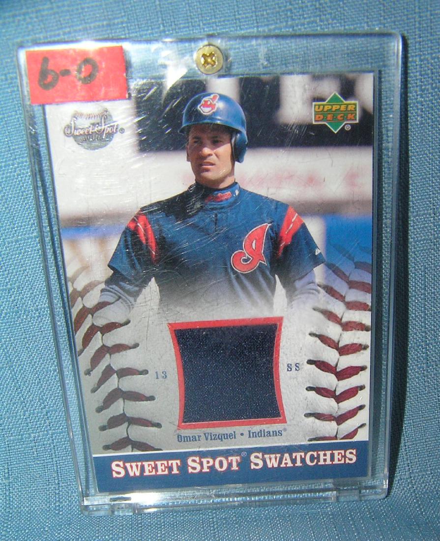 Omar Vizquel game used uniform material baseball card: Omar Vizquel game used uniform material baseball card est. value $35.00-$40.00