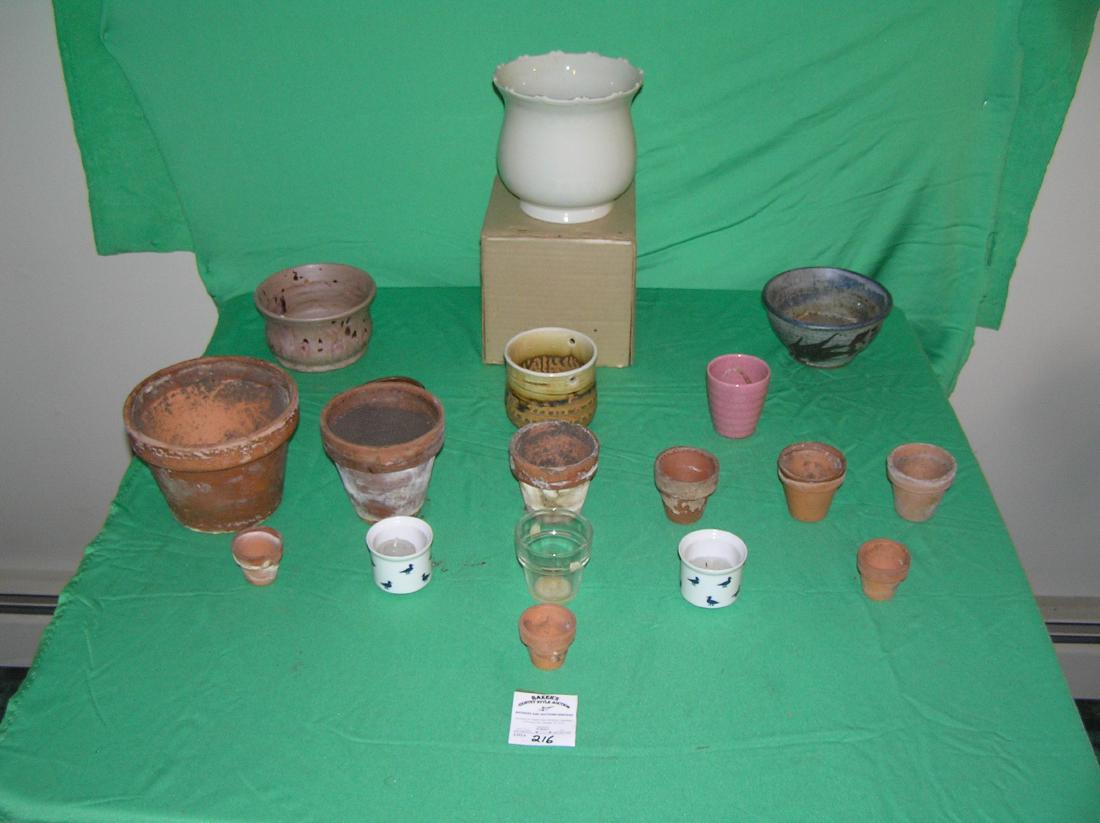 Group of early planters and flower pots: Group of early planters and flower pots includes pottery, earthenware and more est. value $50.00-$75.00