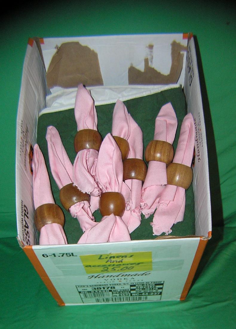 Large box of estate linens: Large box of estate linens includes napkins and napken holdersest. value $50.00-$60.00