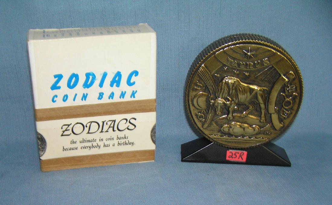Taurus all cast metal Zodiac bank with original box: Taurus all cast metal Zodiac bank with original box est. value $75.00-$80.00