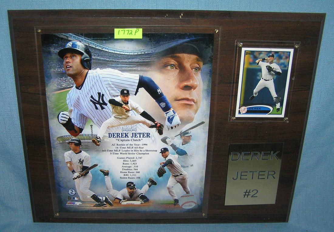 Vintage Derek Jeter photo and baseball card wall plaque: Vintage Derek Jeter photo and baseball card wall plaque titled Capt. Clutch est. value $65.00-$75.00
