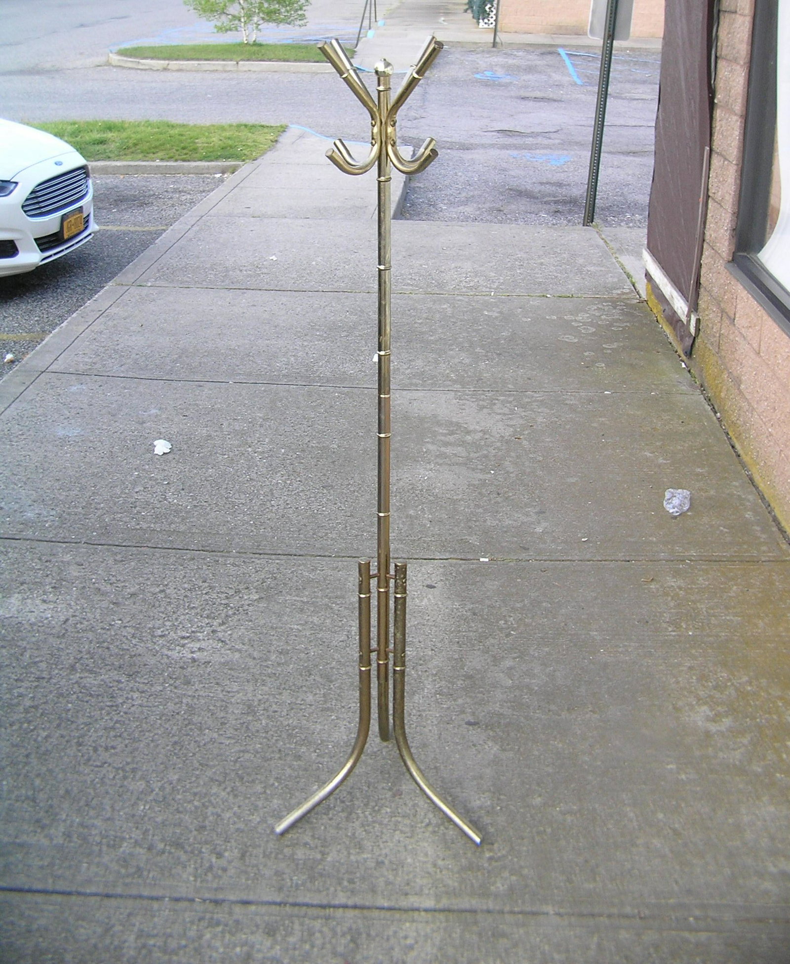 Brass style coat rack: Brass style coat rack est. value $40.00-$50.00