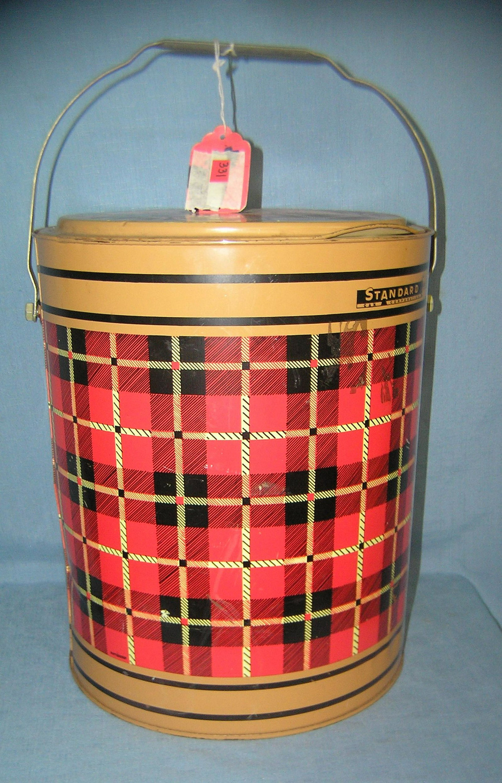 Antique plaid decorated beach, barbecue or travel: Antique plaid decorated beach, barbecue or travel cooler 19 inches tall by 12 inches round circa 1950's from the Standard cooler corp est. value $50.00-$60.00