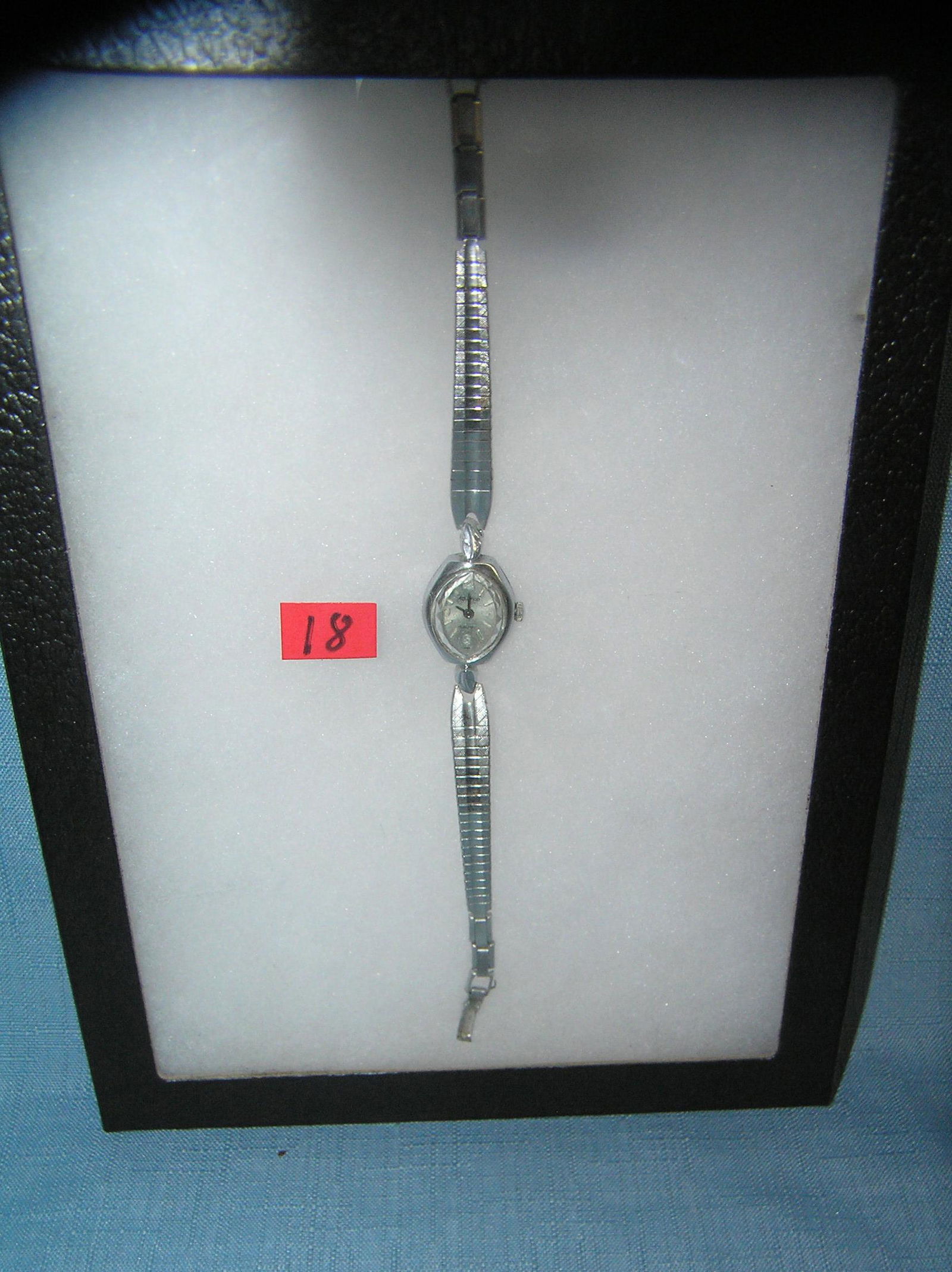 Ladies silver toned wrist watch: Ladies silver toned wrist watch est. value $40.00-$50.00
