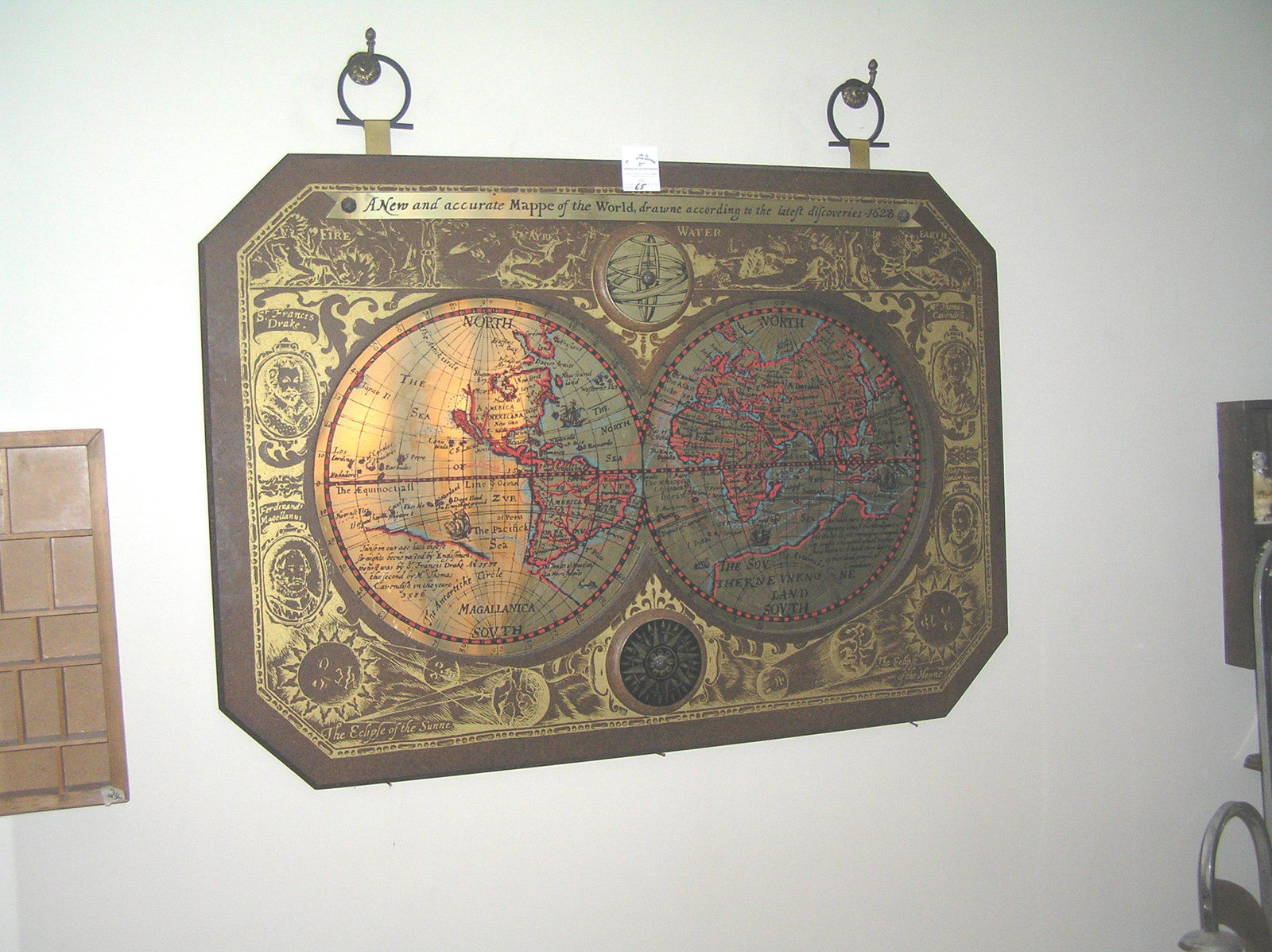Vintage metal and wood map of the world: Vintage metal and wood map of the world est. value $250.00-$300.00