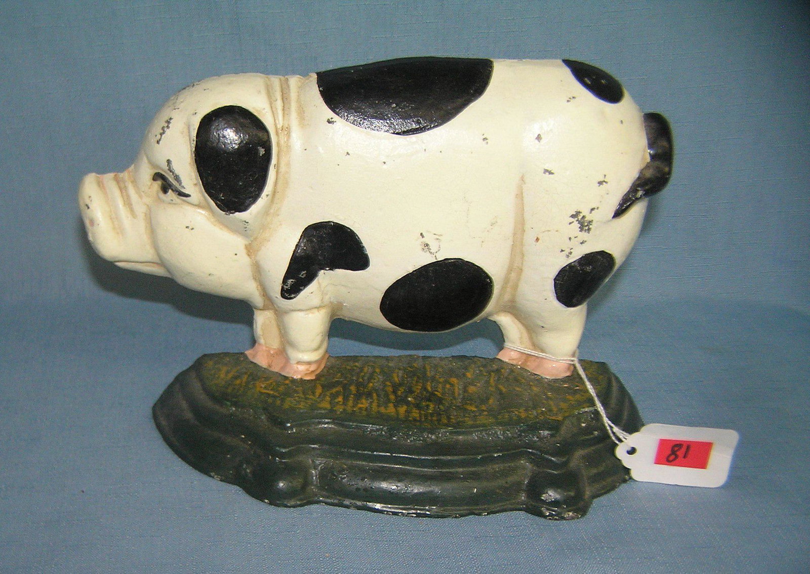 Cast iron pig door stop: Cast iron pig door stop est. value $30.00-$35.00