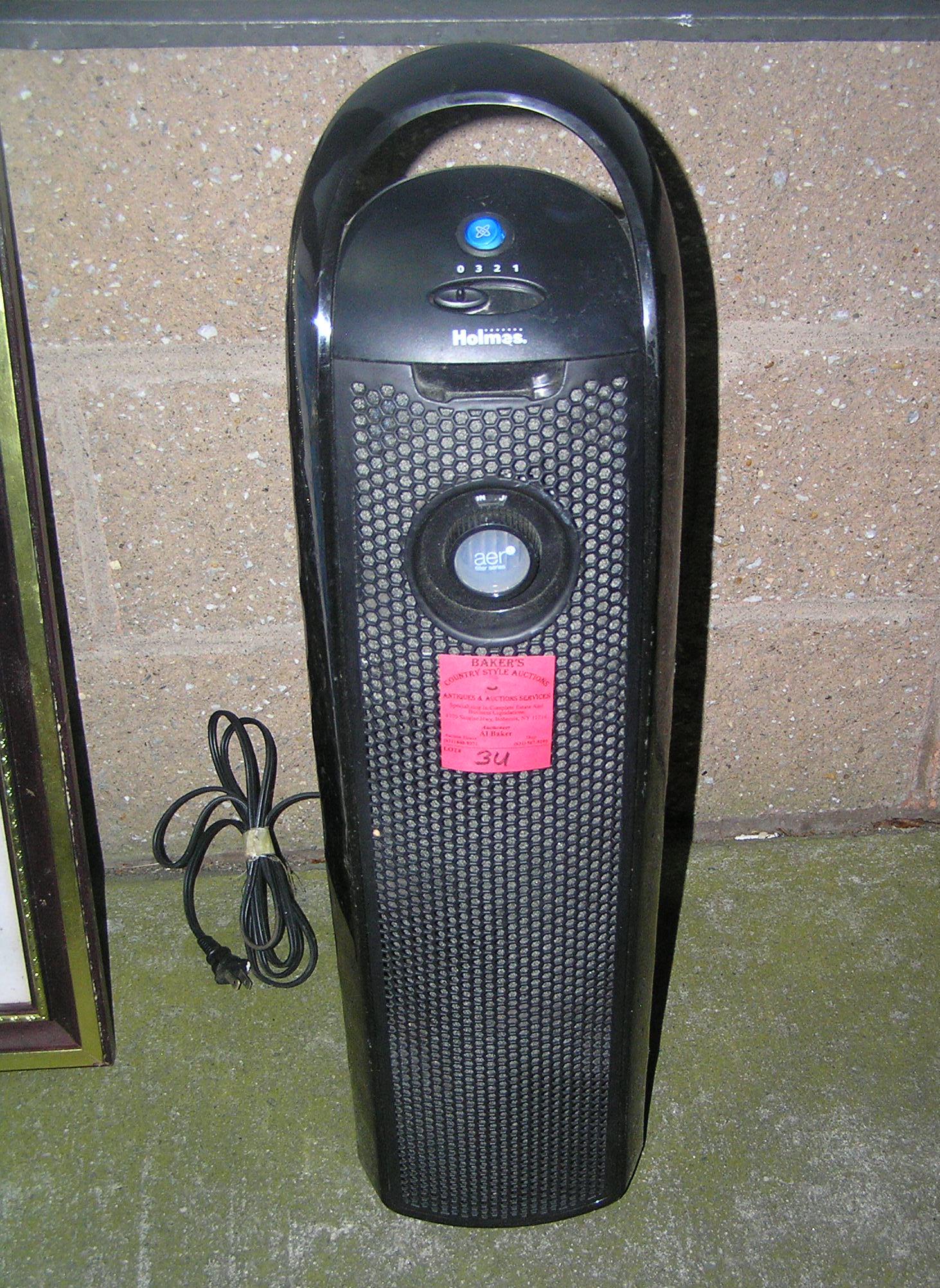 Holmes air purifier multi speed with hepa filter: Holmes air purifier multi speed with hepa filter, est. value $65.00-$75.00 moving and storage co. seized merchandise