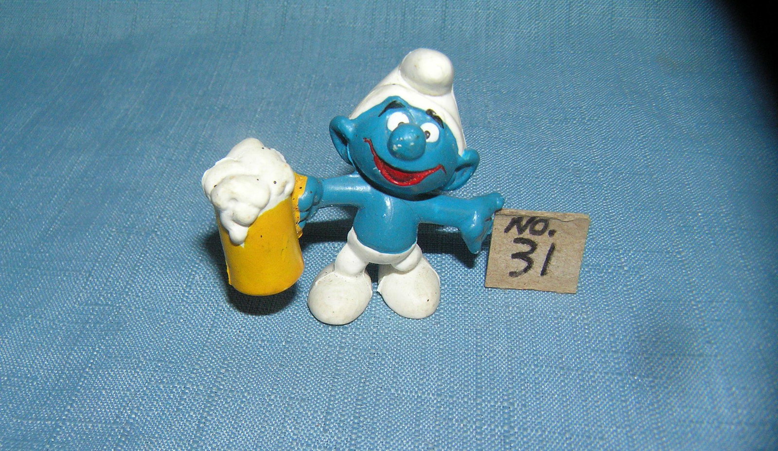 Vintage beer drinking Smurf: Vintage beer drinking Smurf marked on base Bully copyright by Peyo est. value $20.00-$25.00