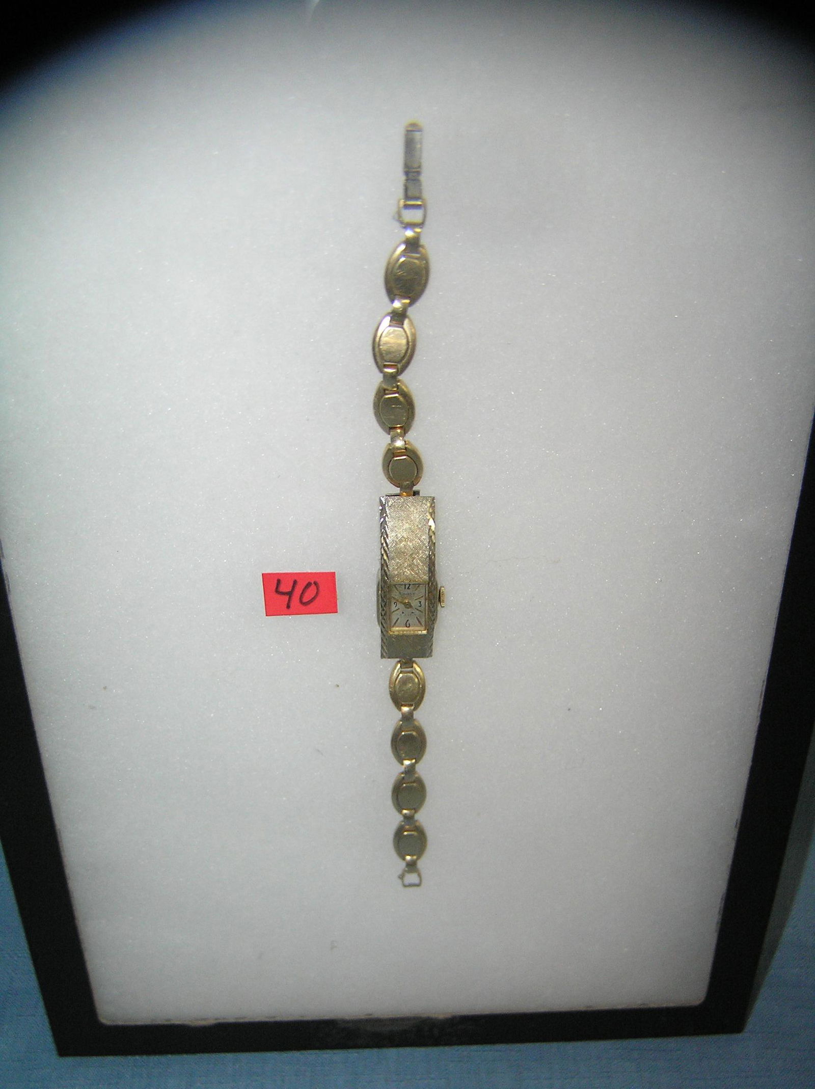 Early Swank gold toned wrist watch with 17 jewels: Early Swank gold toned wrist watch with 17 jewels est. value $50.00-$75.00