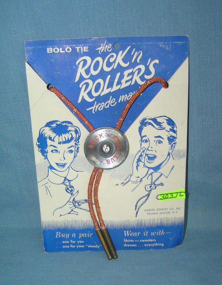 Rock and Rollers Bolo tie mint on display card: Rock and Rollers Bolo tie mint on display card est. value $35.00-$40.00