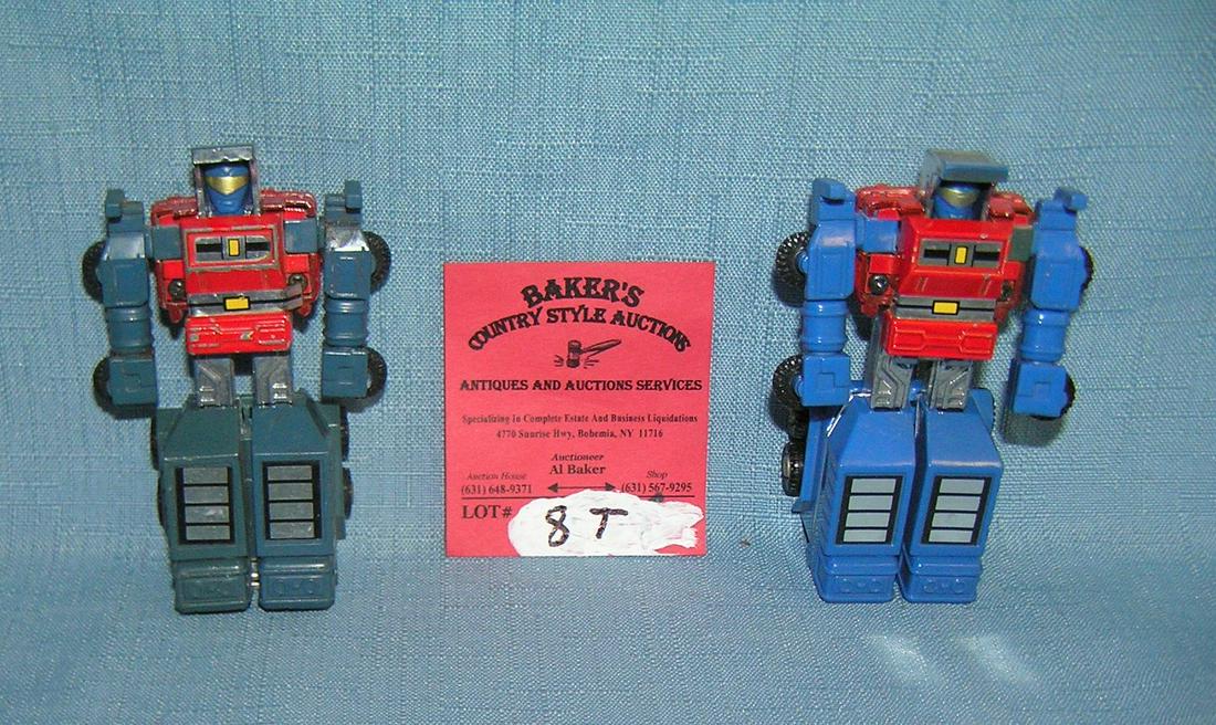 Pair of vintage Bandai transformer robot toys: Pair of vintage Bandai transformer robot toys dated 1983 est. value $40.00-$45.00