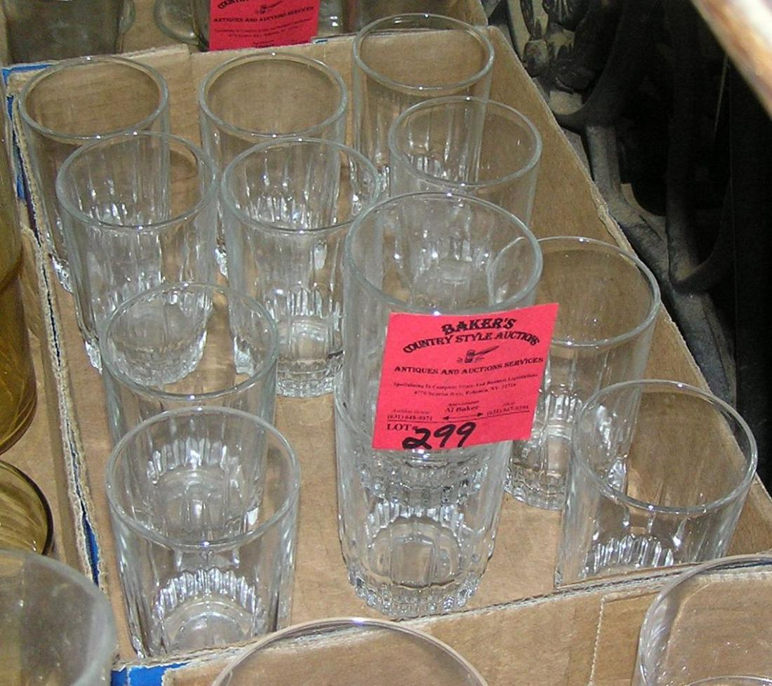 Box full of vintage juice glasses: Box full of vintage juice glasses est. value $35.00-$40.00