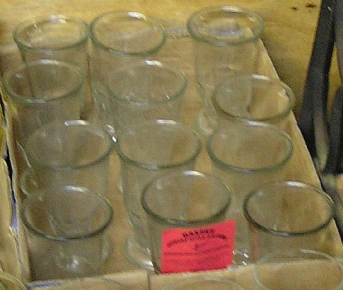 Box full of vintage juice glasses: Box full of vintage juice glasses est. value $35.00-$40.00