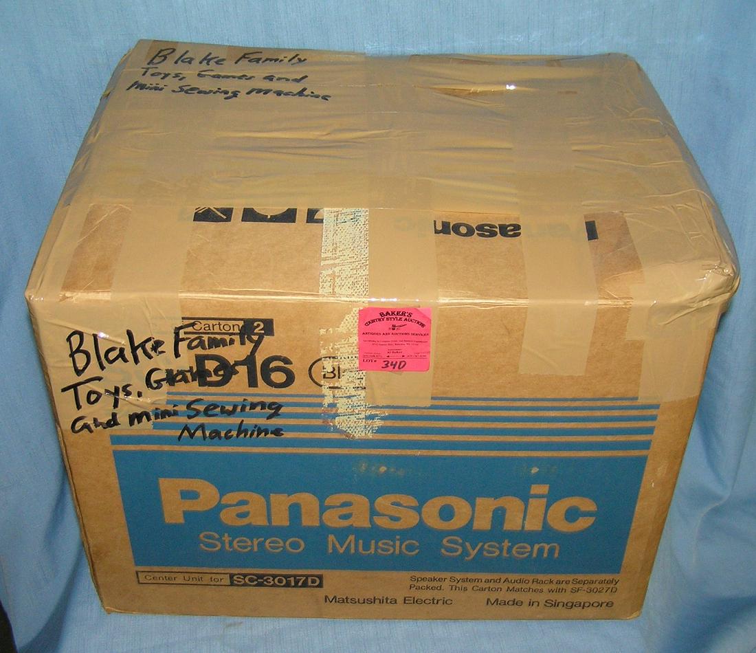 Moving and Storage Company mystery box lot: Moving and Storage Company mystery box lot marked Blake Family toys, games and mini sewing machine large box full part of a moving and storage company seized or unclaimed merchandise group sent to auc