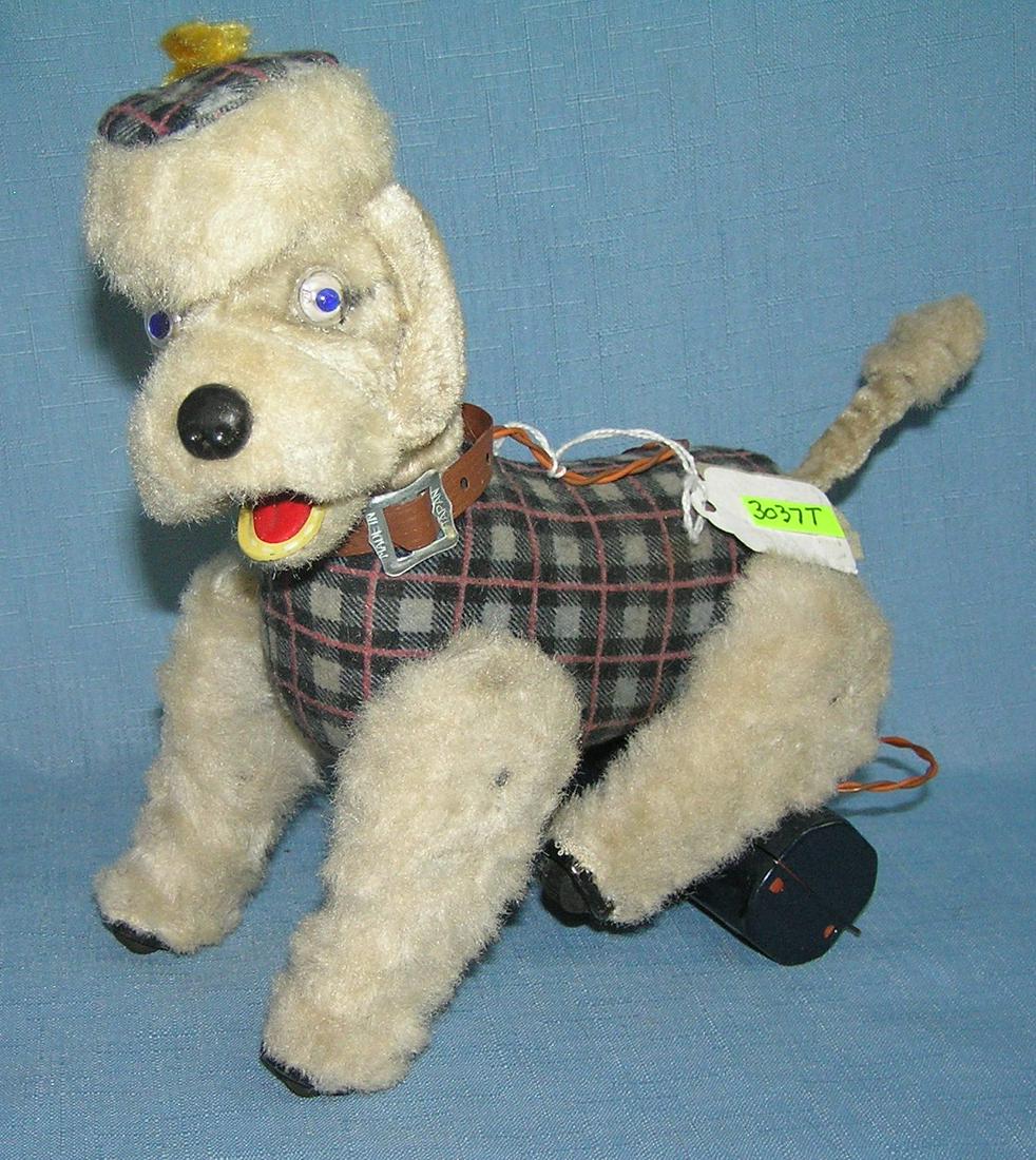 Battery operated mechanical poodle toy: Battery operated mechanical poodle toy in working condition circa 1950's est. value $80.00-$100.00