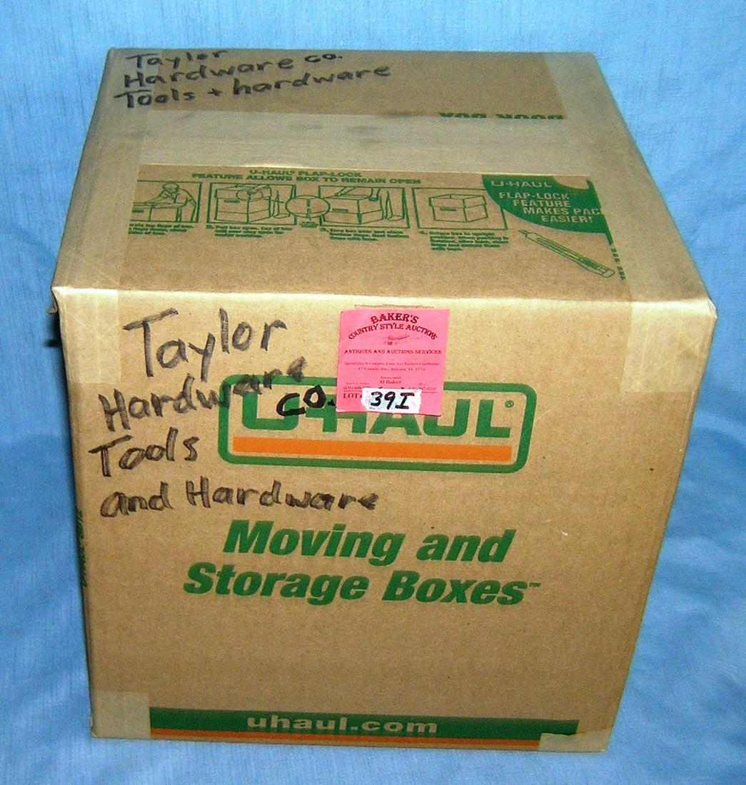 Moving and Storage Company mystery box lot: Moving and Storage Company mystery box lot marked Taylor Hardwae Co. tools and hardware part of a moving and storage company seized or unclaimed merchandise group sent to auction for liquidation est. 