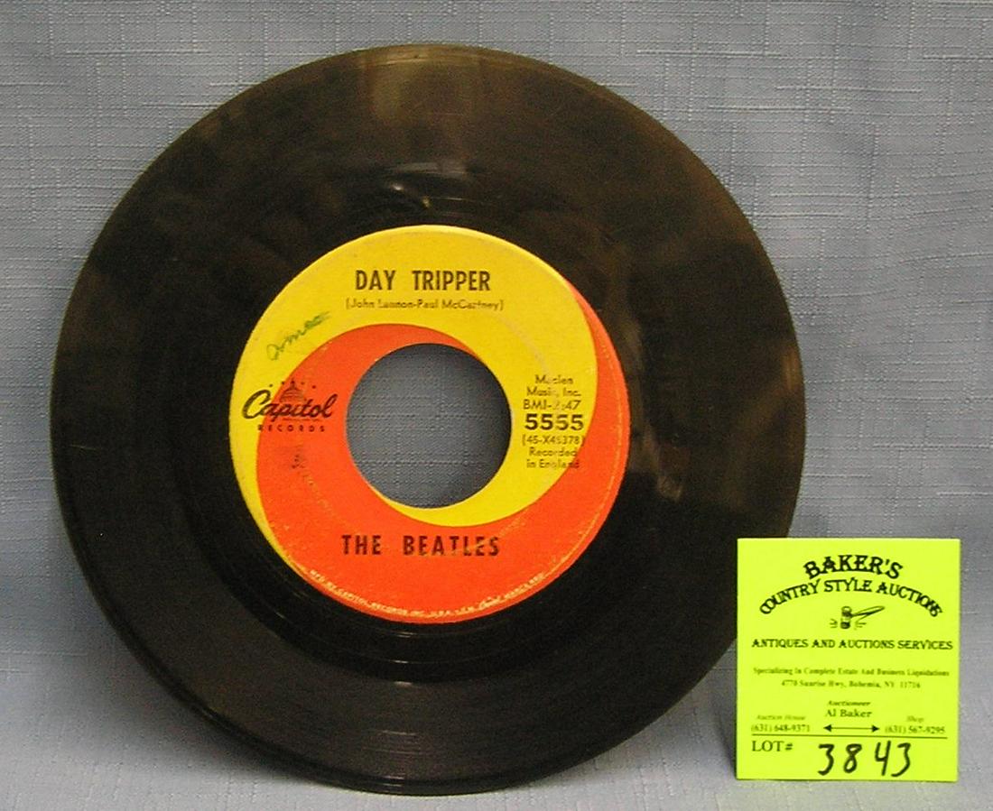 Beatles 45 rpm record by Capital Records: Vintage Beatles 45rpm record by Capital Records est. value $15.00-$20.00