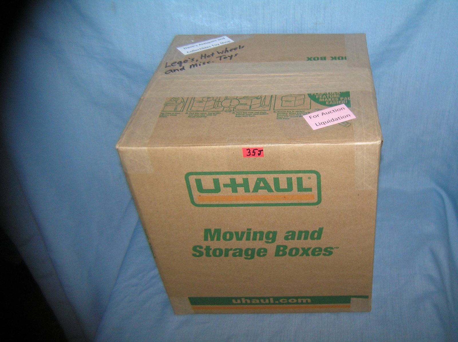 Moving and Storage Company mystery box lot marked: Moving and Storage Company mystery box lot marked Dave's Antiques and Collectibles Toy Shop marked Lego's, Hot Wheels and misc. toys part of a moving and storage company seized or unclaimed merchandis