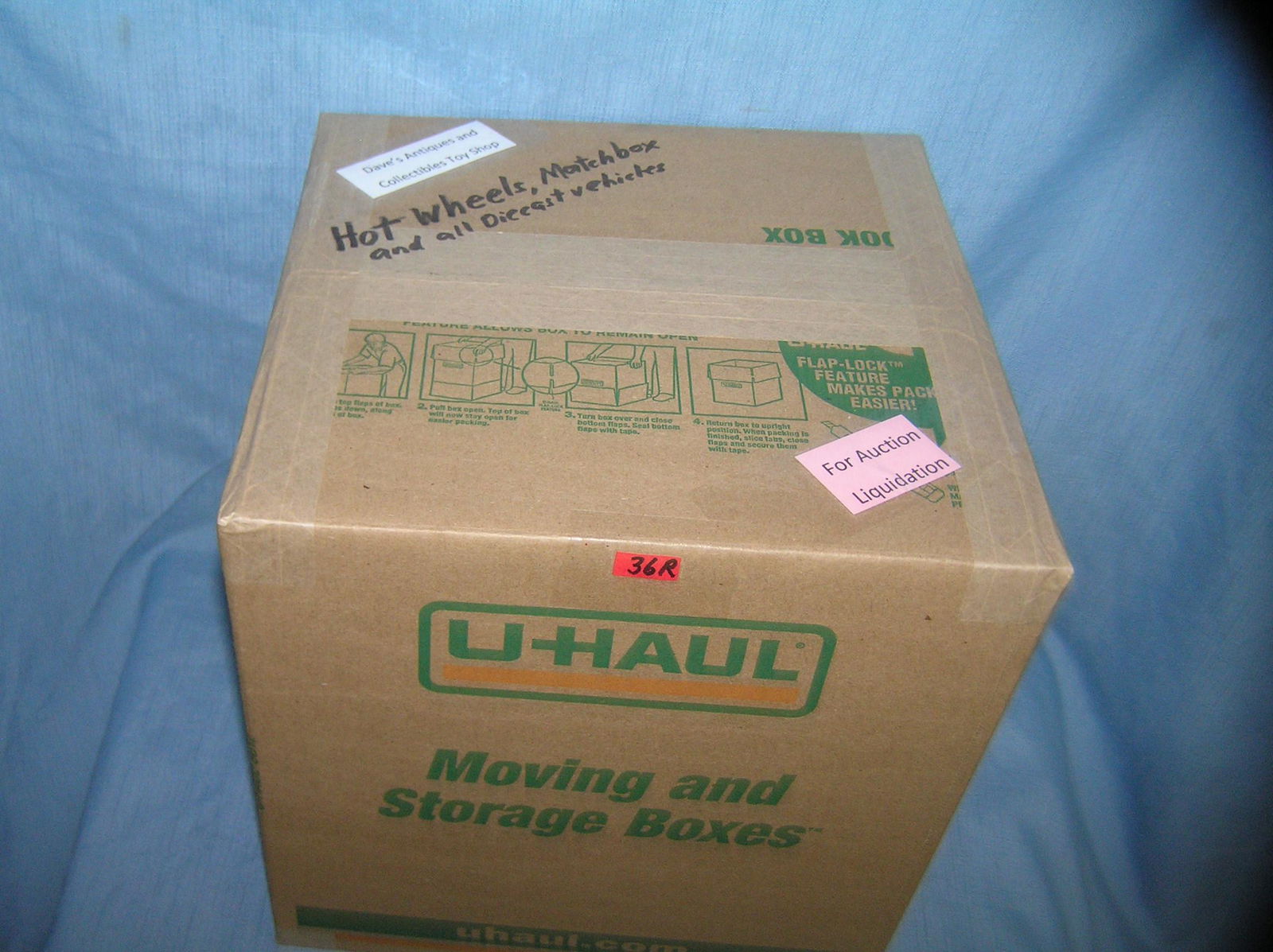 Moving and Storage Company mystery box lot marked: Moving and Storage Company mystery box lot marked Dave's Antiques and Collectibles Toy Shop marked Hot Wheels, Match Box and all die cast vehicles part of a moving and storage company seized or unclai