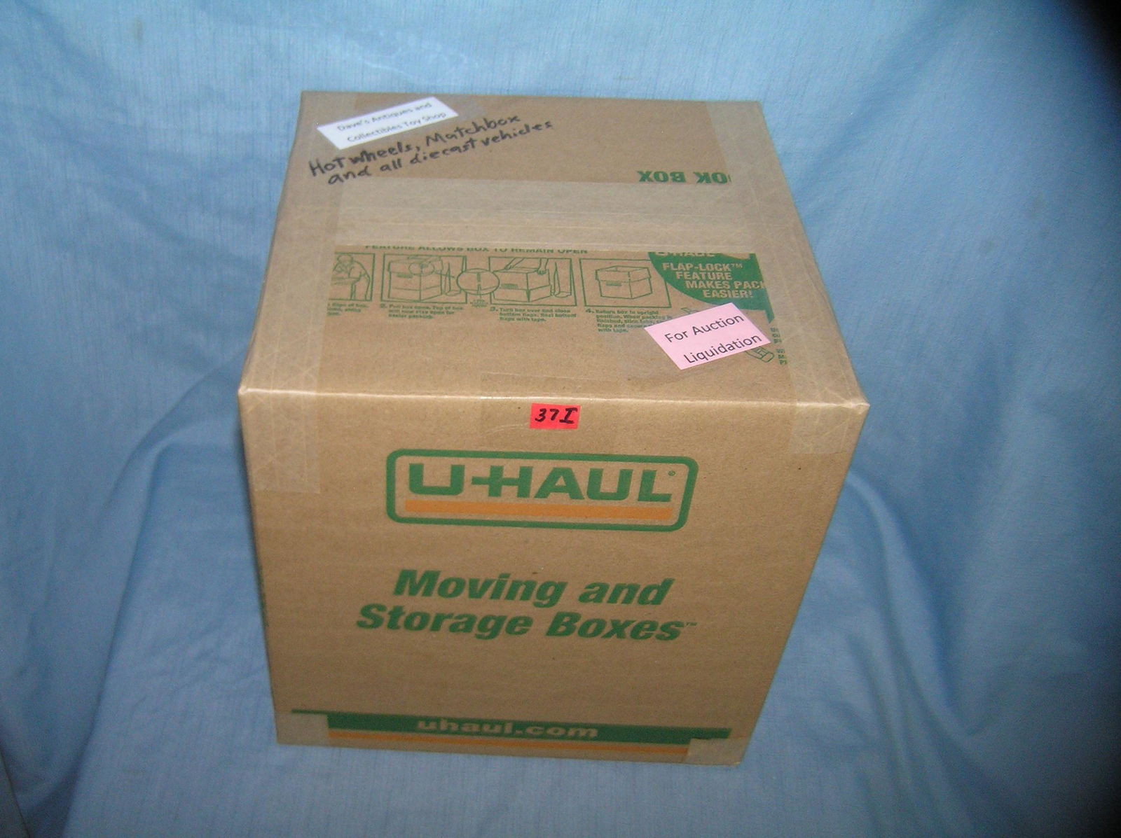 Moving and Storage Company mystery box lot marked: Moving and Storage Company mystery box lot marked Dave's Antiques and Collectibles Toy Shop marked Hot Wheels, Match Box and all die cast vehicles part of a moving and storage company seized or unclai