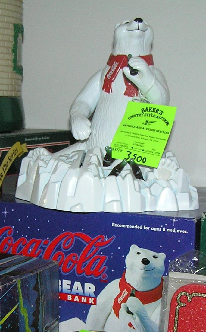 Coca Cola mechanical polar bear bank: Coca Cola mechanical polar bear bank, fourth in the series mint in original box est. value $150.00-$175.00