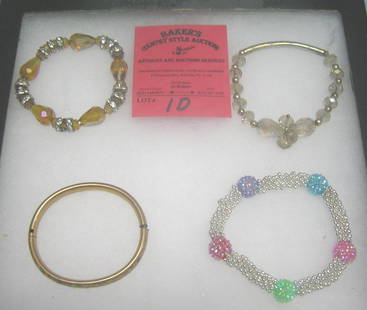 Group of costume jewelry bracelets: Group of costume jewelry bracelets, one is an antique, gold filled circa early 1900's est. value $30.00-$40.00
