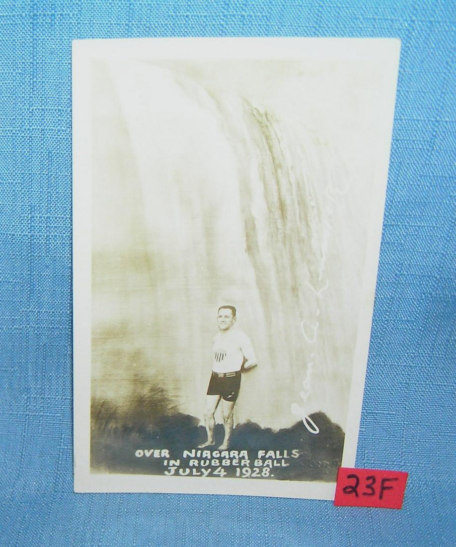 Man over Niagara Falls in a rubber ball post card: Man over Niagara Falls in a rubber ball dated July 4, 1928 great photo illustrated post card of the famous stunt man in front of the great falls photo bears the signature of this famous stunt man est.