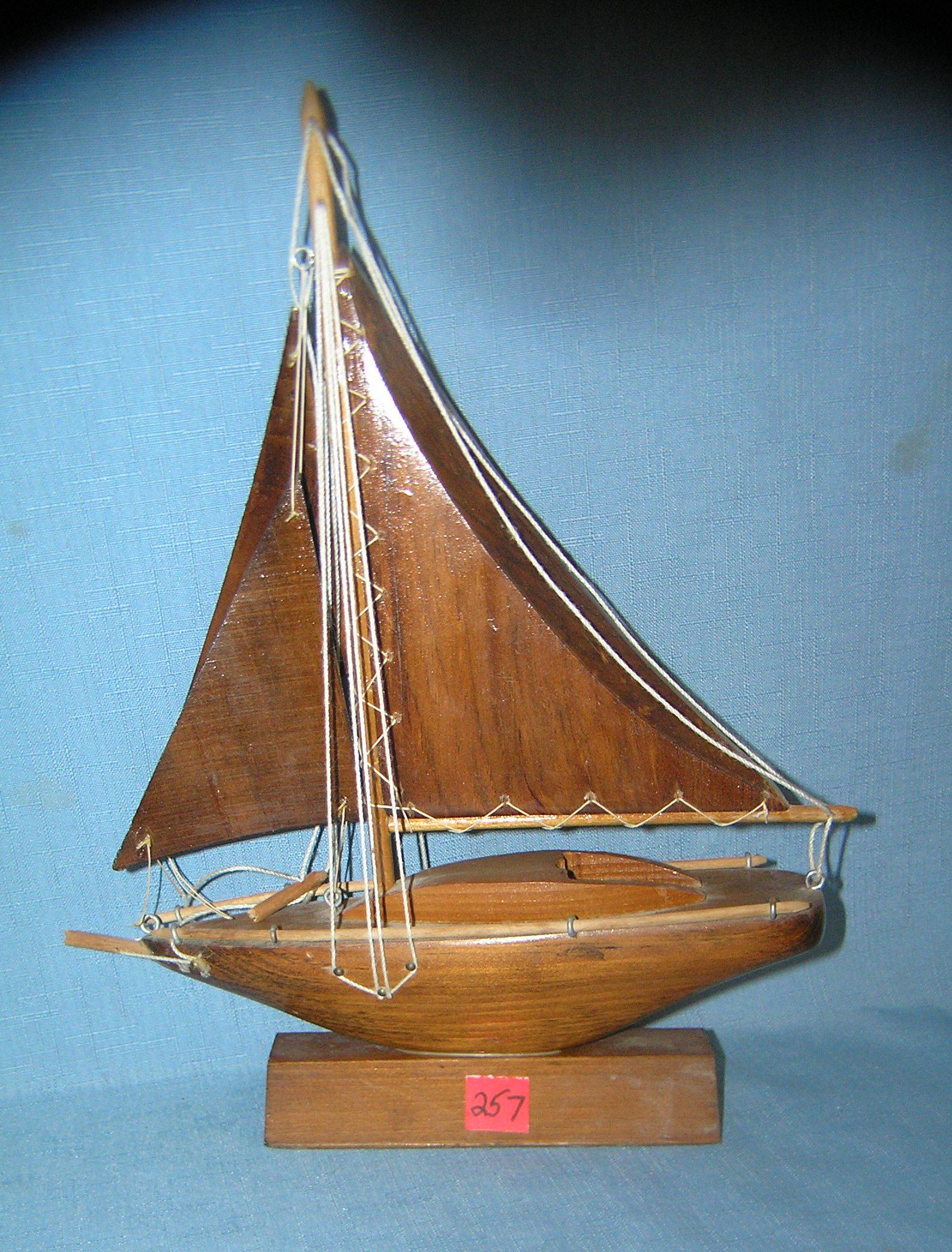 Hand carved wood sail boat on stand: Hand carved wood sail boat on stand est. value $30.00-$35.00