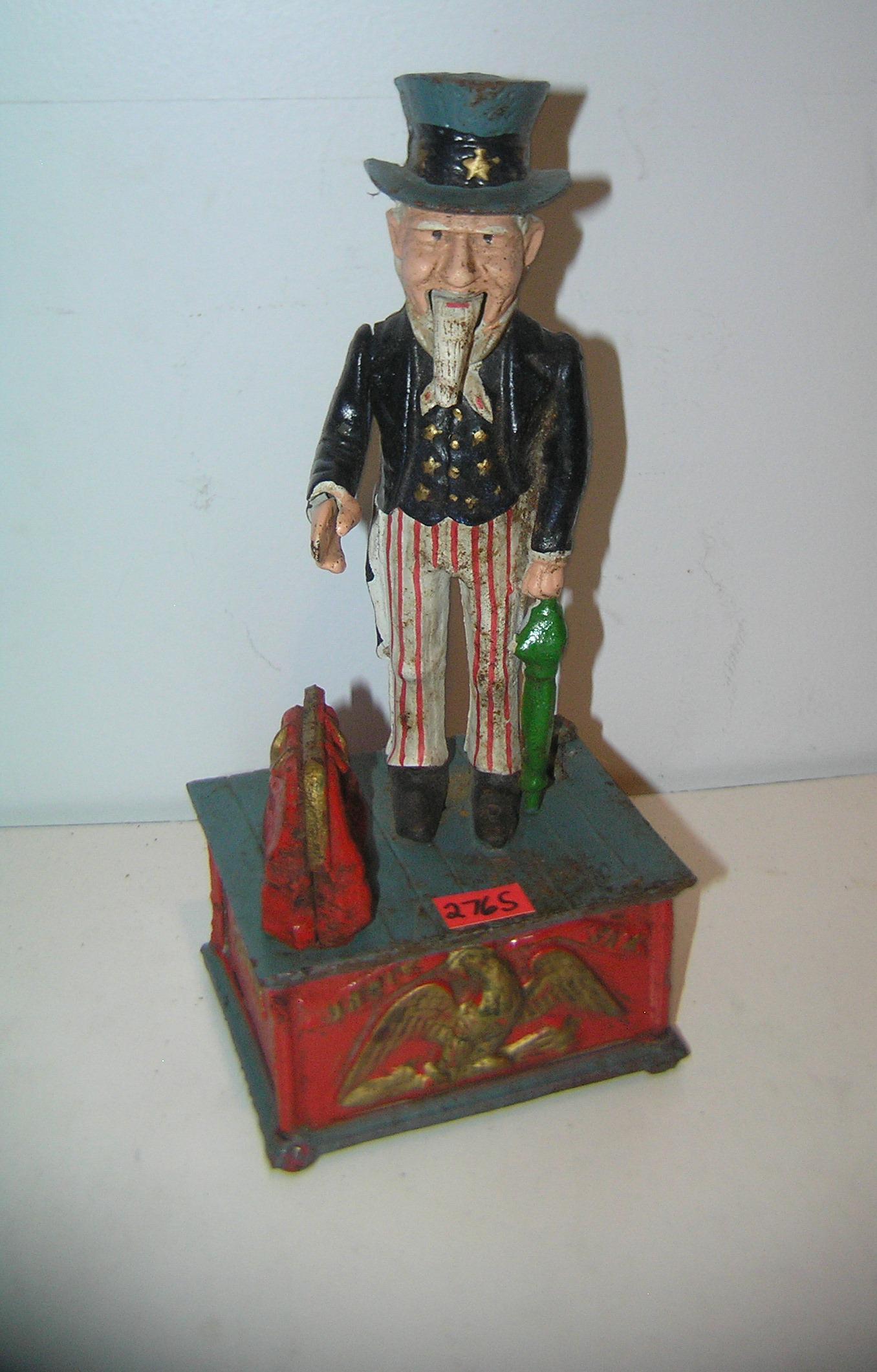 Vintage hand painted Uncle Sam mechanical bank: Vintage hand painted Uncle Sam mechanical bank cast iron 1960's est. value $175.00-$200.00