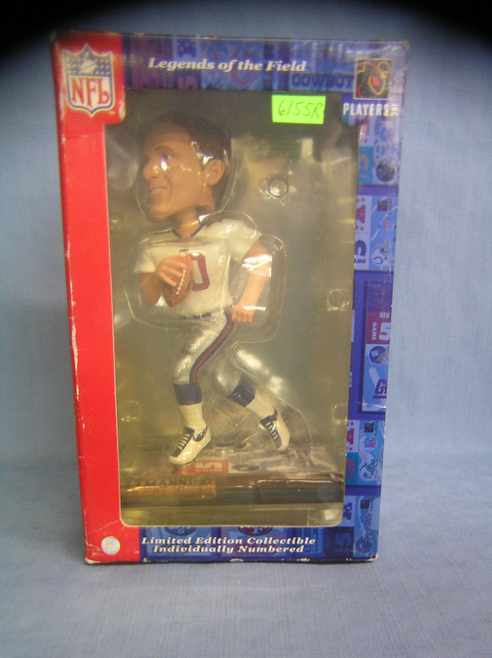 Eli Manning Bobble head football figure: Eli Manning Bobble head football figure in original box est. value $30.00-$40.00