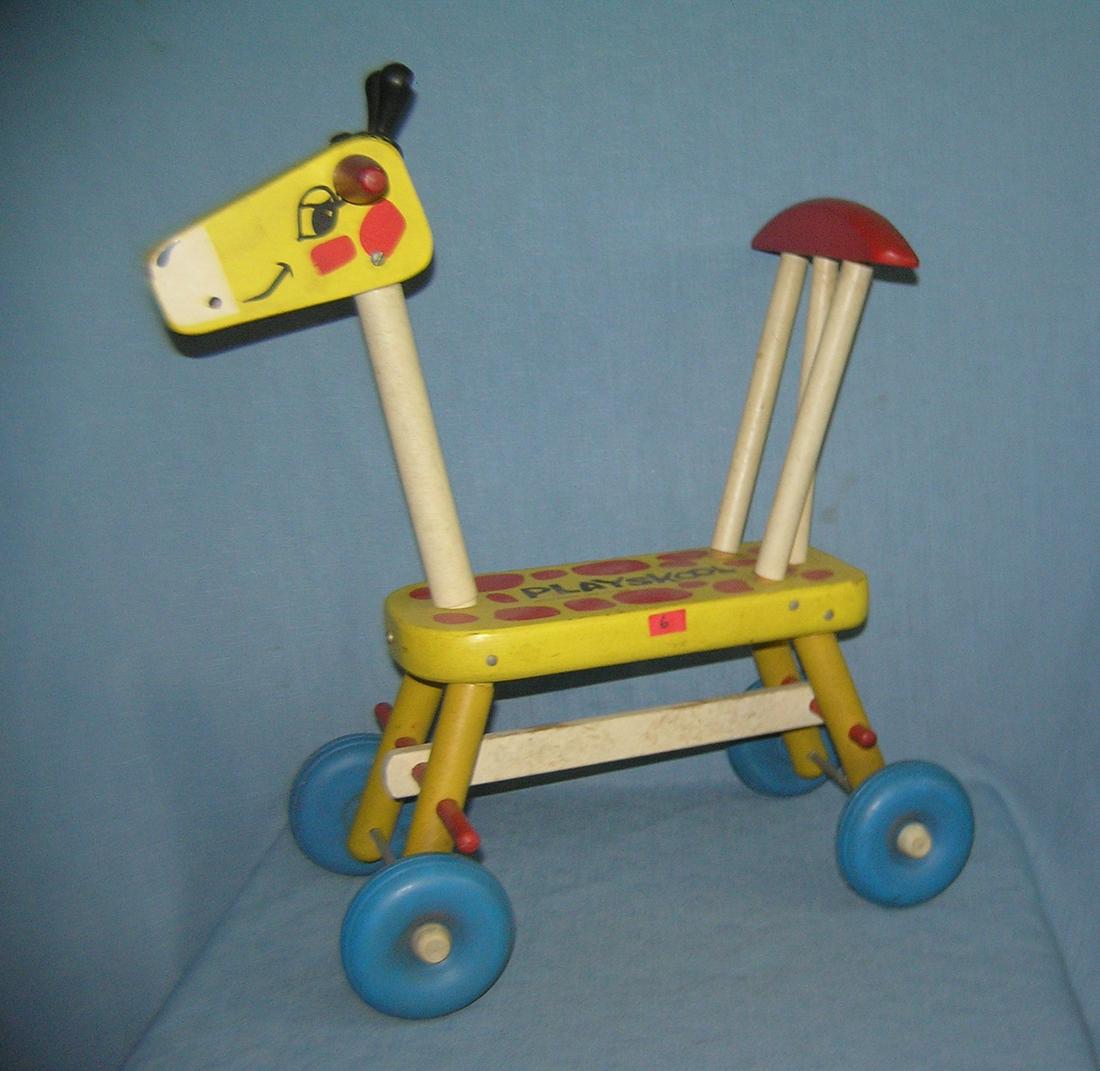 Vintage Playskool ride on giraffe toy dated 1966: Vintage Playskool ride on giraffe toy dated 1966 est. value $40.00-$50.00
