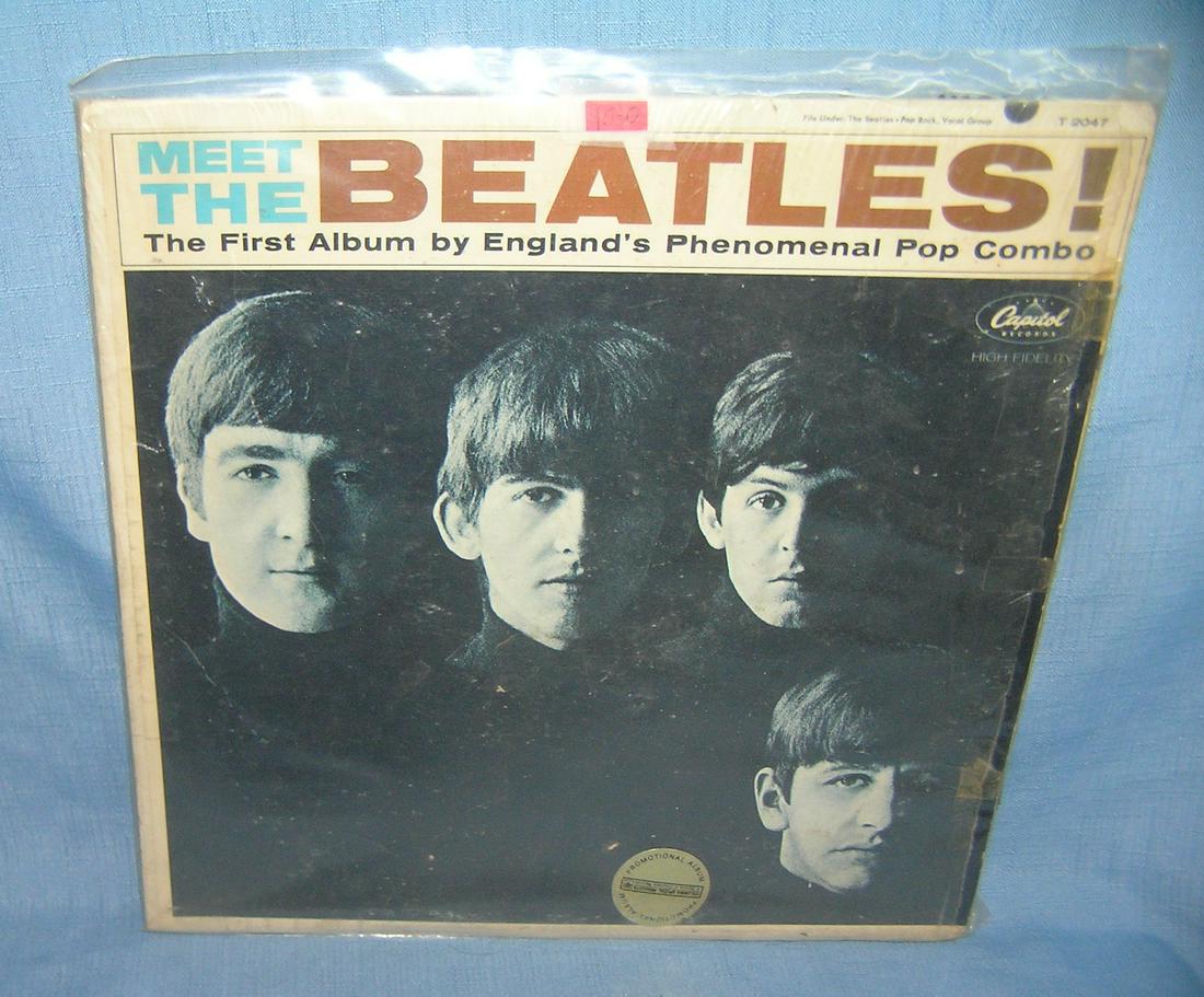 Meet the Beatles the first album: Meet the Beatles the first album good condition 1964 est. value $125.00-$150.00