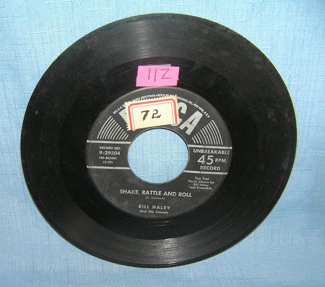 Bill Haley and his Comets vintage 45 rpm record: Bill Haley and his Comets vintage 45 rpm record "Shake, Rattle and Roll" and "A. B. C. Boogie" 1950's est. value $30.00-$35.00