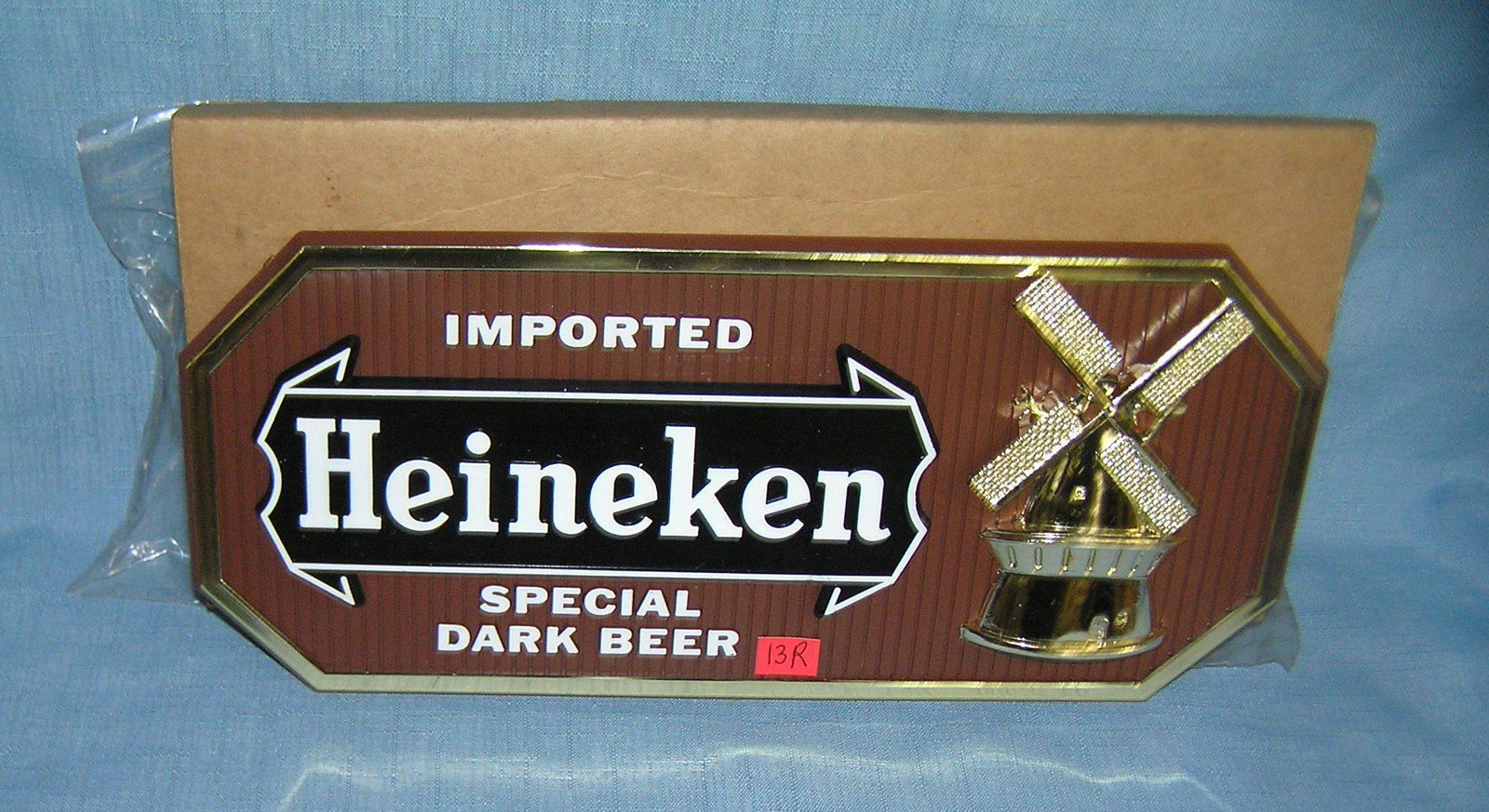 Heineken imported beer advertising display sign: Vintage Heineken imported beer advertising display sign mint old dealer store stock with original packing and box est. value $35.00-$40.00