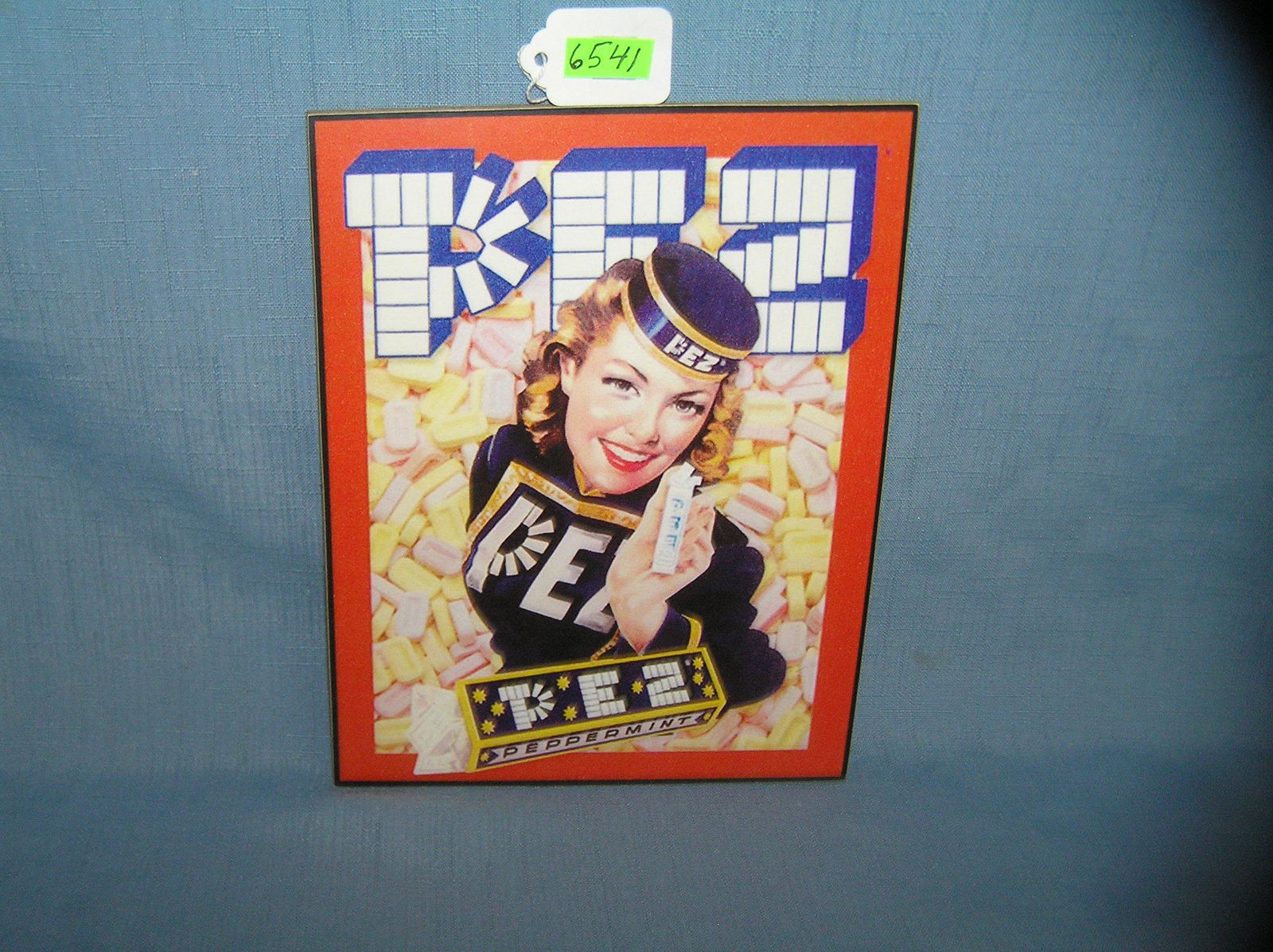 Vintage PEZ advertising sign: Vintage PEZ advertising sign est. value $30.00-$40.00