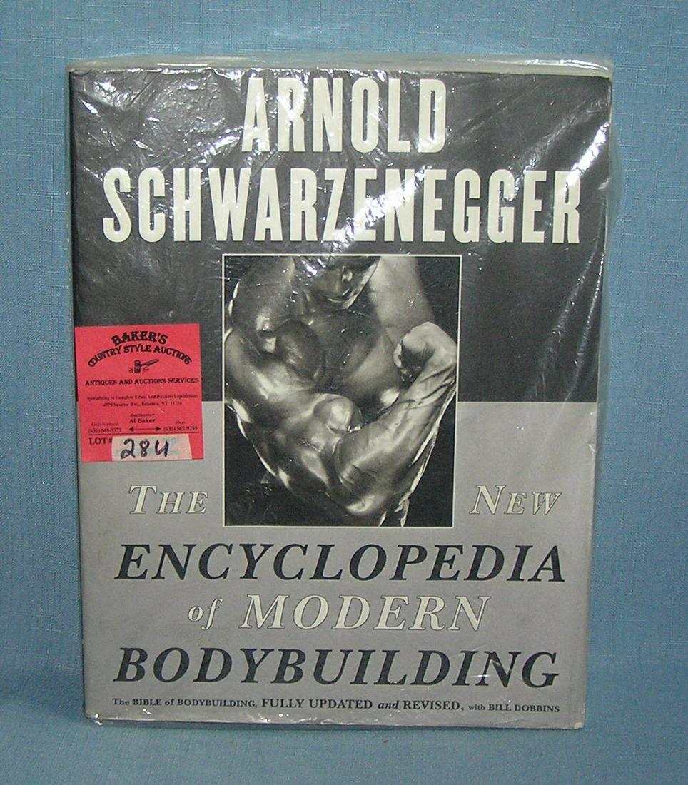 A. Schwarzenegger encyclopedia of mod. body building: Arnold Schwarzenegger the new encyclopedia of modern body building, the bible of body building circa 1978 this book is almost 2 inches thick, loaded with vintage photos and tips on body building est. 