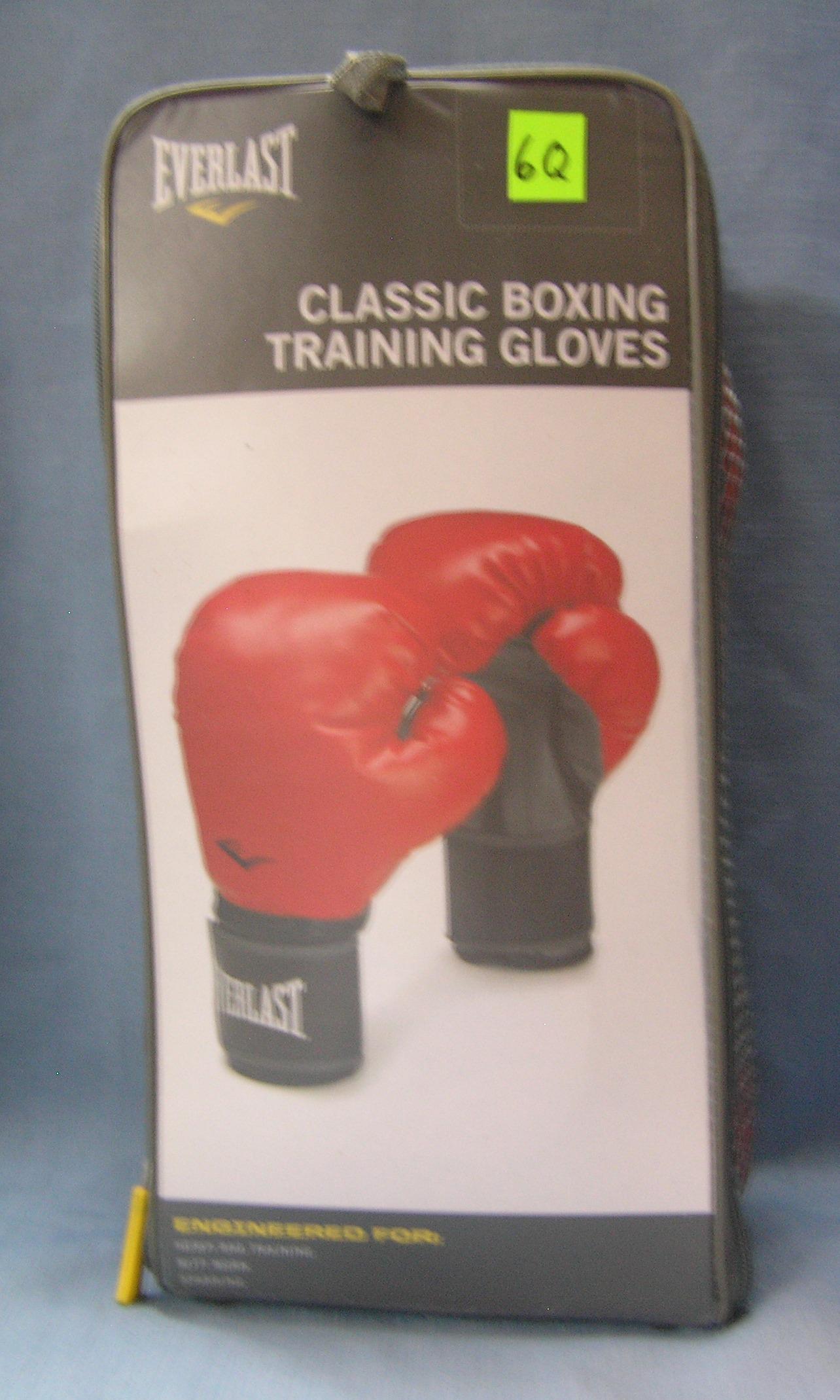 Pair of Everlast plastic boxing training gloves: Pair of Everlast plastic boxing training gloves est. value $40.00-$45.00