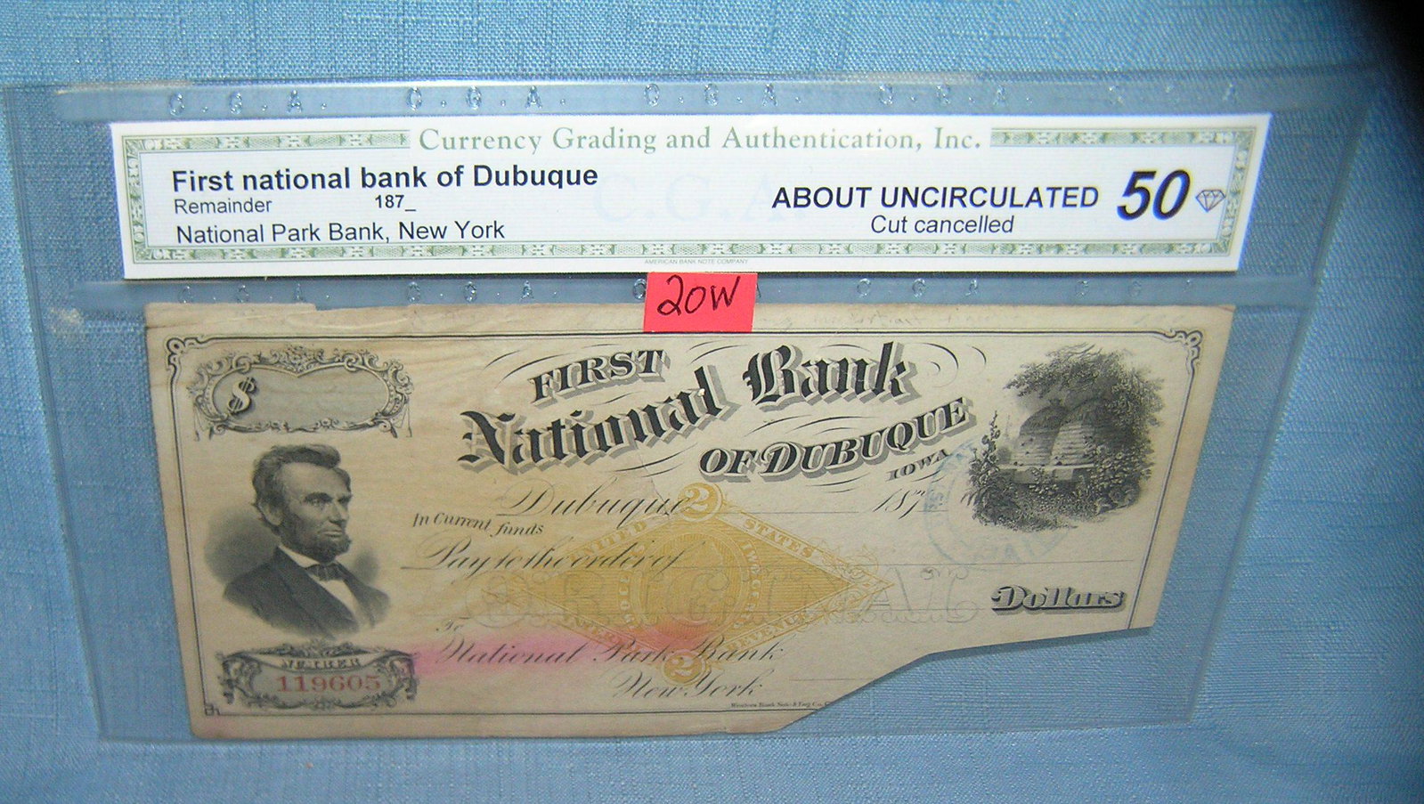 National Park Bank bank check circa mid 1800's: National Park Bank of NY First National Bank of Dubuqe bank check circa mid 1800's with great Lincoln image check graded about uncirculated with cut lower corner est. value $75.00-$80.00