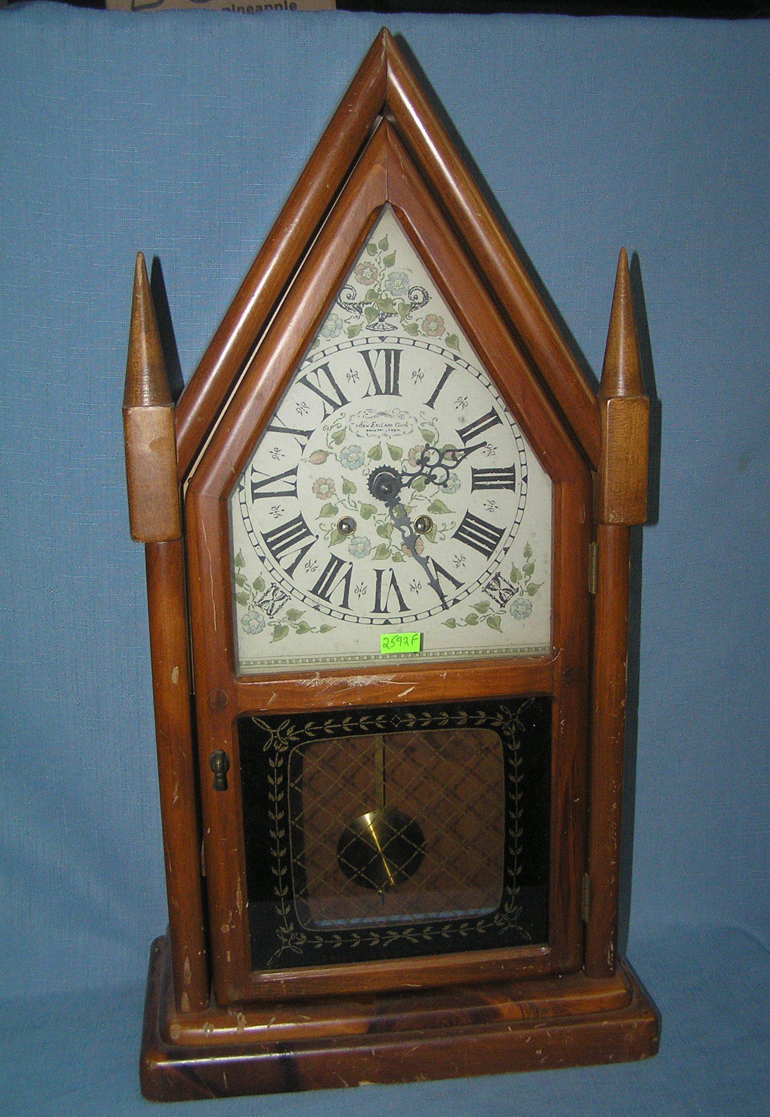 Cathedral style shelf clock: Cathedral style shelf clock by New England Clock Co. Bristol CT est. value $150.00-$200.00