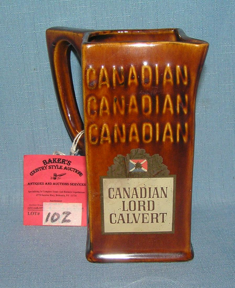 Vintage imported Canadian Lord Calvert pitcher: Vintage imported Canadian Lord Calvert Porcelain Whiskey Water pitcher est. value $ 40.00-$50.00